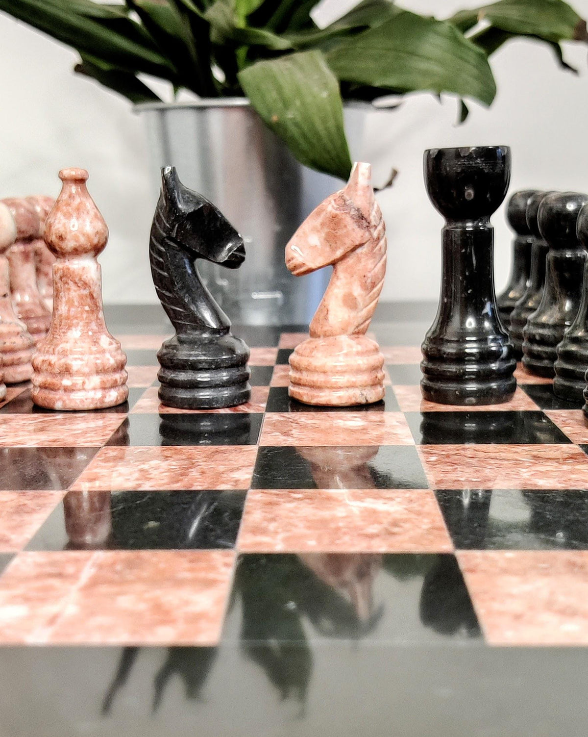 Black and pink marble knights close up