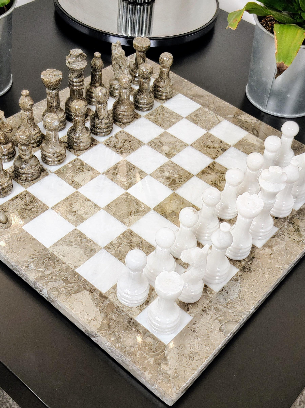 Grey and white stone chess set, angled view